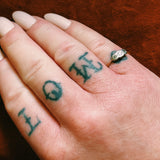 Gold and platinum diamond trilogy ring