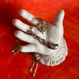 Solid gold lucky bean charm