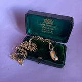 Solid gold lucky bean charm