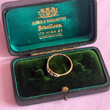 Gold and platinum diamond trilogy ring