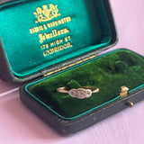 Gold and platinum diamond trilogy ring