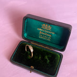 Gold and platinum diamond trilogy ring